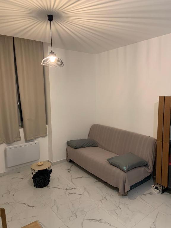 Posezení v ubytování Le Cocon du Parc - Charmant T2 neuf au calme