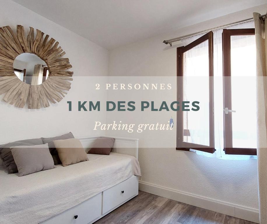 Ένα ή περισσότερα κρεβάτια σε δωμάτιο στο 1km des plages Parking gratuit