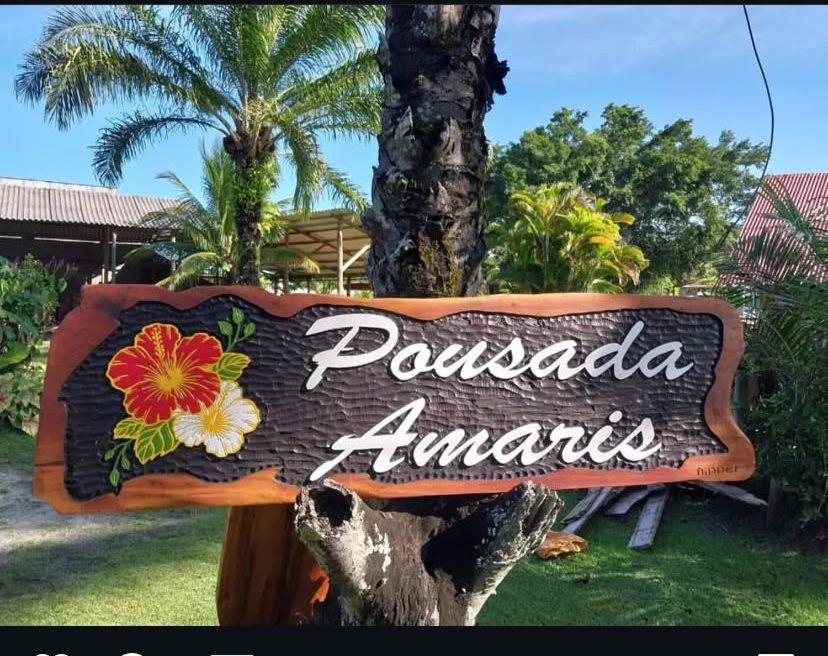 a sign that says pasadena amarosa amps at Pousada Amaris in Penha