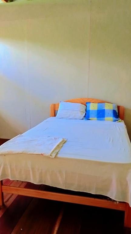 Postel nebo postele na pokoji v ubytování Refugio Chabelita Hostel