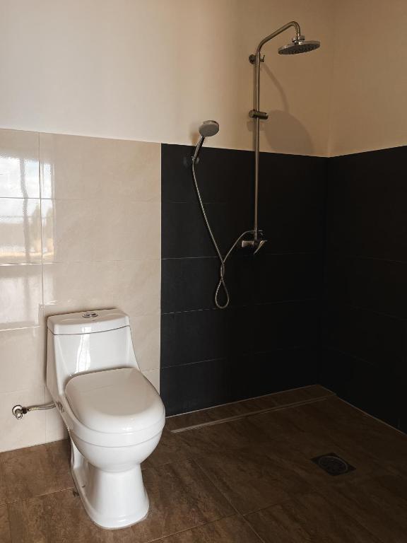 Koupelna v ubytování Seaview Mansion Dalaguete Deluxe Apartment 10