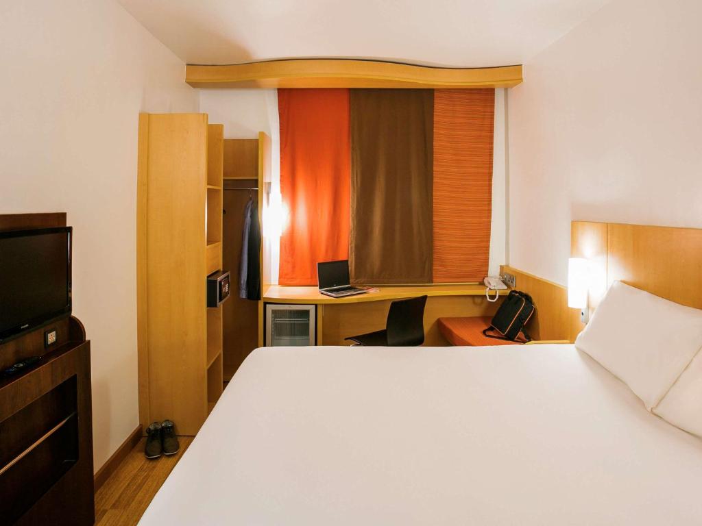 Postel nebo postele na pokoji v ubytování Ibis Lagos Ikeja