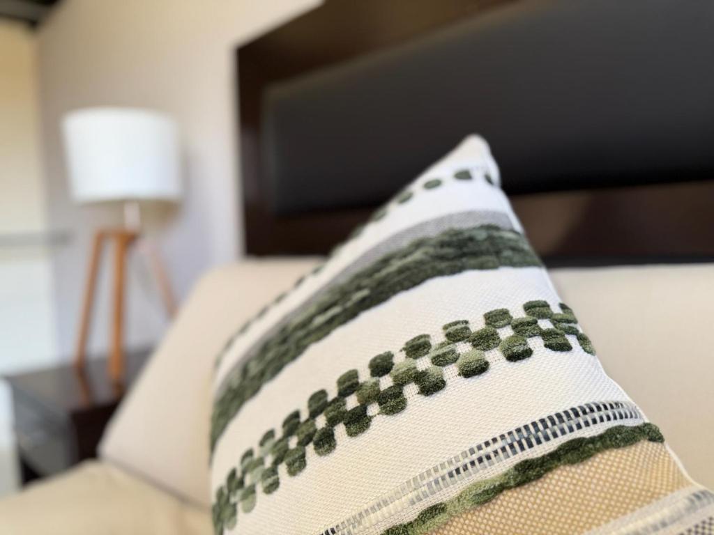 Postel nebo postele na pokoji v ubytování CASA SÁNCHEZ