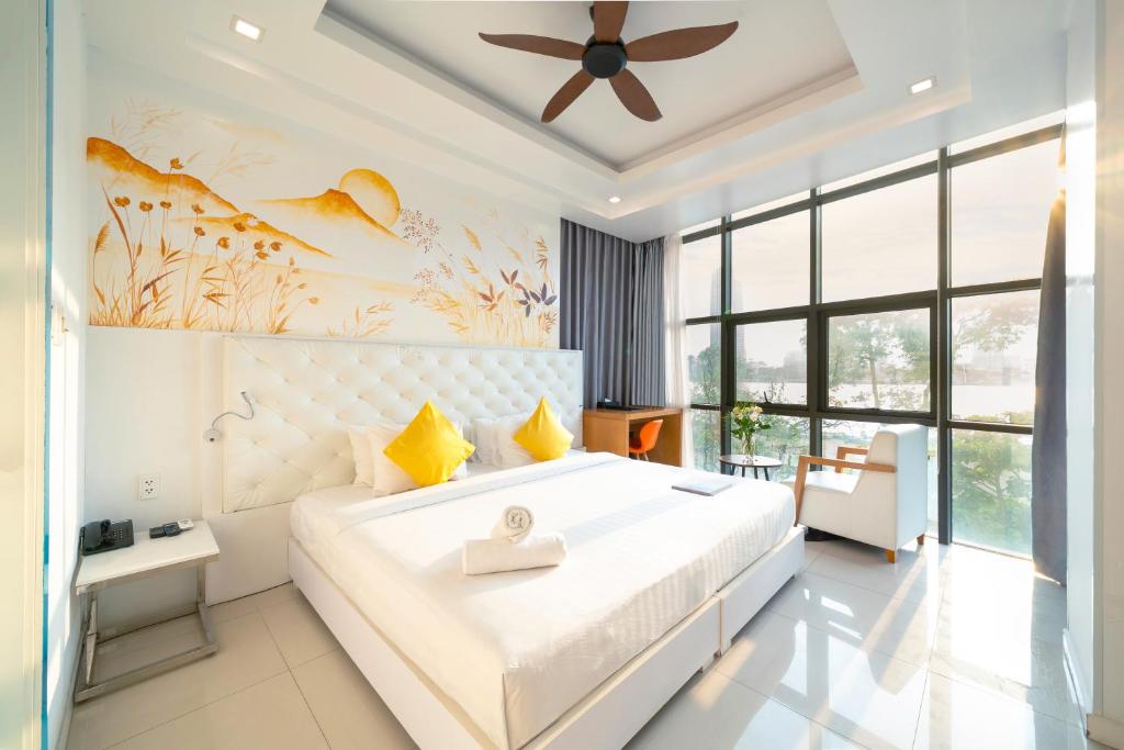 Postel nebo postele na pokoji v ubytování Star City Riverside Hotel By Haviland