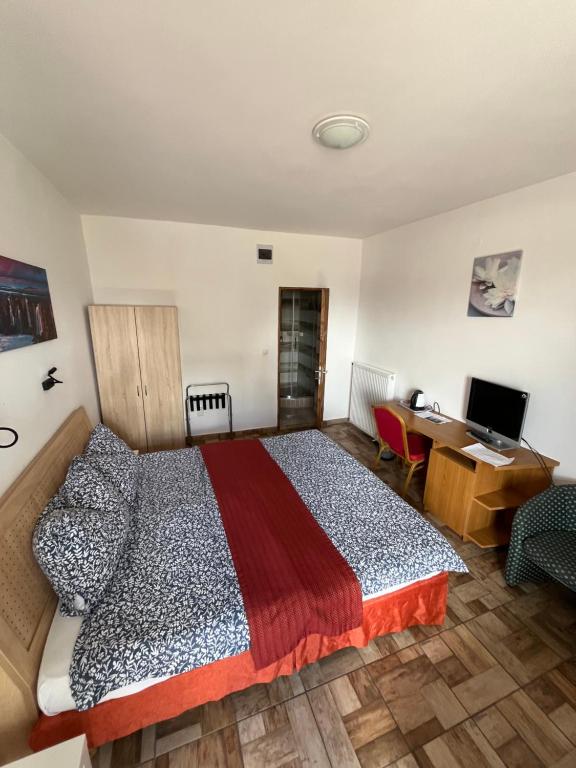 Postel nebo postele na pokoji v ubytování Centrum Motel