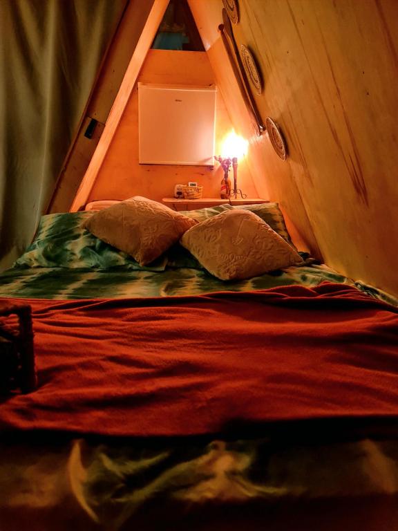 Postel nebo postele na pokoji v ubytování Mucajá Camping&Glamping 80mts Ilha do Amor