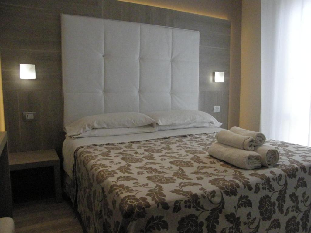 Postel nebo postele na pokoji v ubytování Hotel Stefan Room & Breakfast