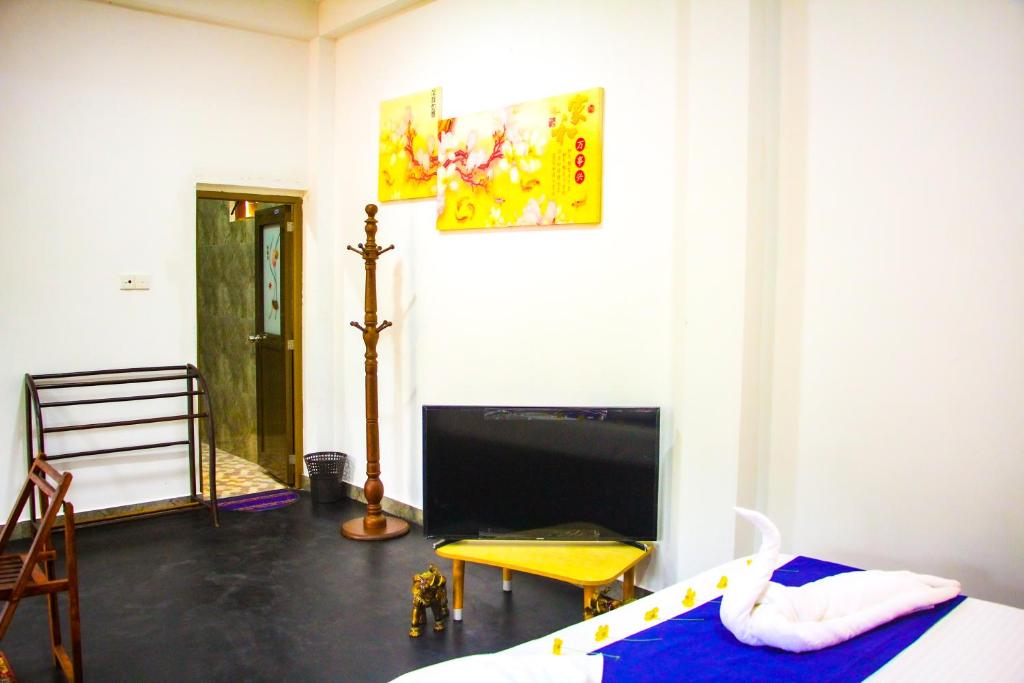 TV a/nebo společenská místnost v ubytování Sigiriya Dream Inn