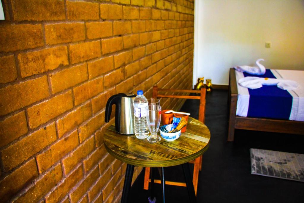 Postel nebo postele na pokoji v ubytování Sigiriya Dream Inn