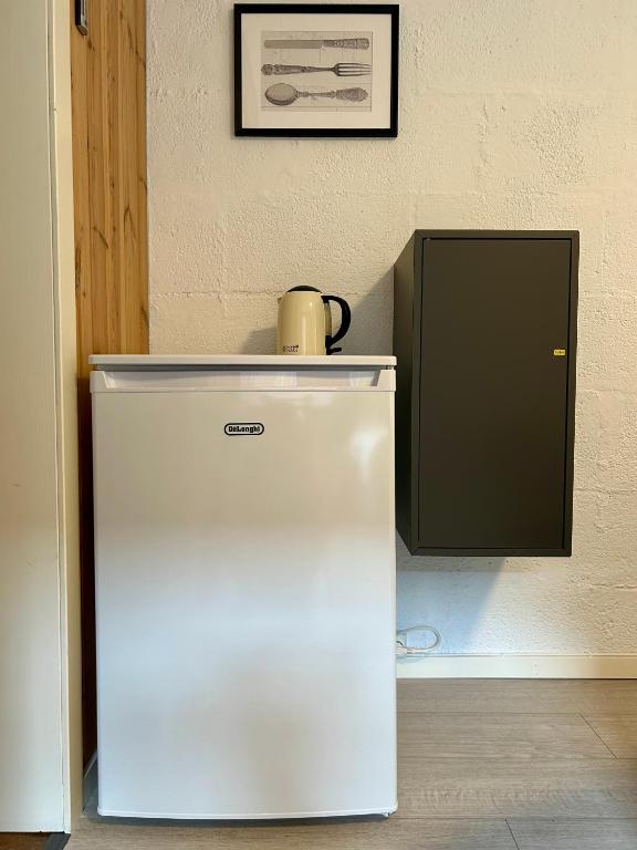 Kuchyň nebo kuchyňský kout v ubytování Simple room