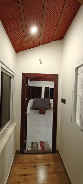 Postel nebo postele na pokoji v ubytování Rv Resorts Yercaud
