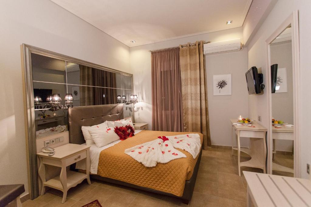 Postel nebo postele na pokoji v ubytování Hotel Aheron