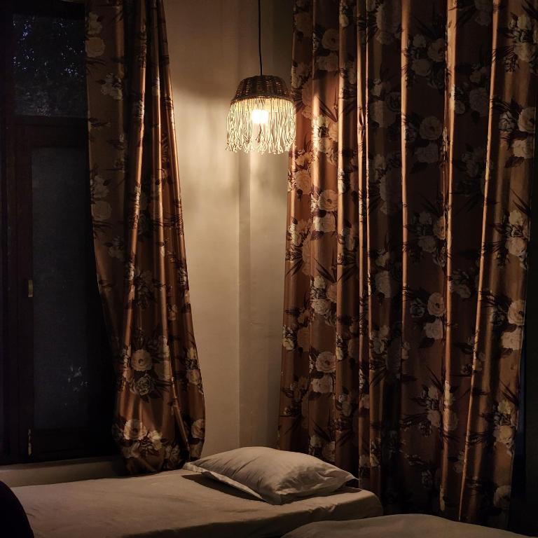 Postel nebo postele na pokoji v ubytování Hotel Mahadev