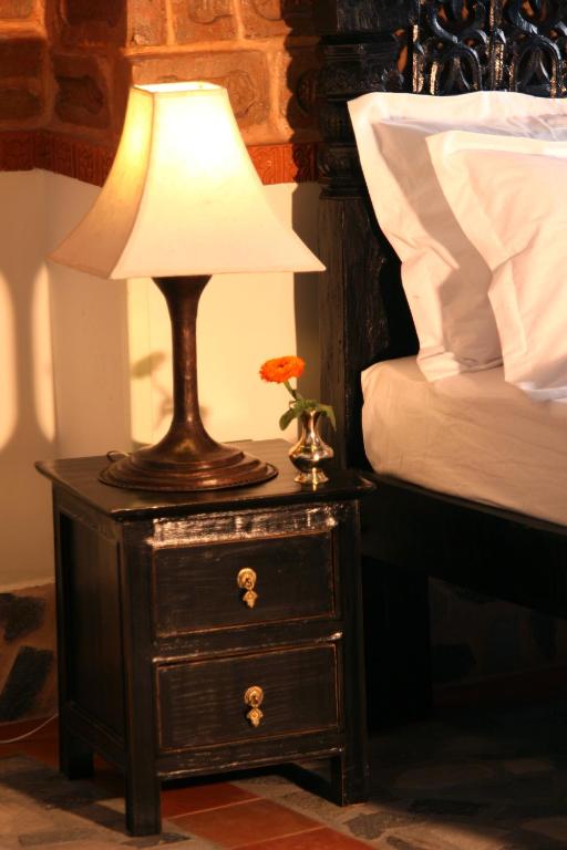 Postel nebo postele na pokoji v ubytování Hotel Heritage