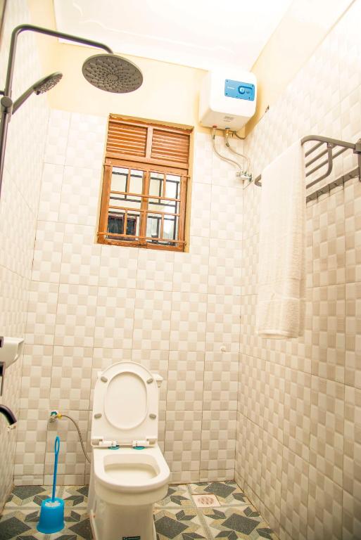 Koupelna v ubytování PK Sleek Suites