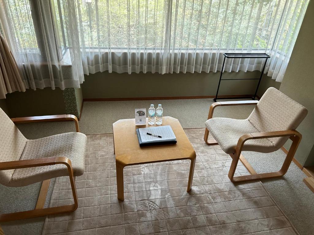 Posezení v ubytování Kozuka Hisanoha