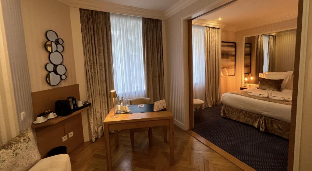 Postel nebo postele na pokoji v ubytování Maison LUTETIA R