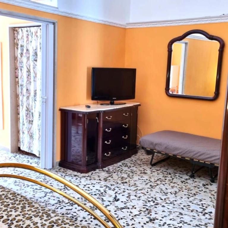 TV a/nebo společenská místnost v ubytování Casa Lucia - Siti storici e Saline Naturali - Pet Friendly