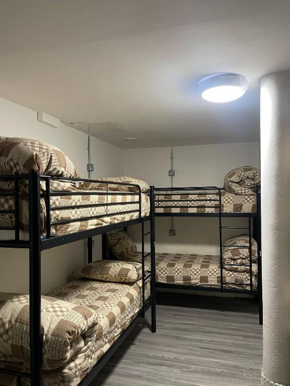 Postel nebo postele na pokoji v ubytování Rahman Hostel