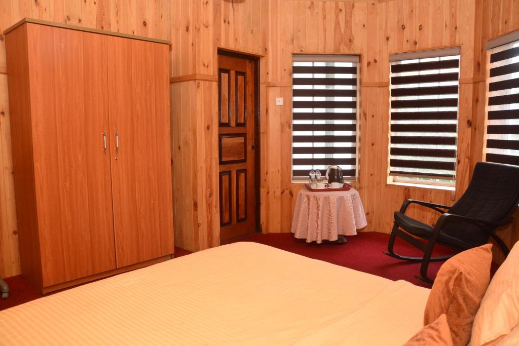 Postel nebo postele na pokoji v ubytování The Fern Inn