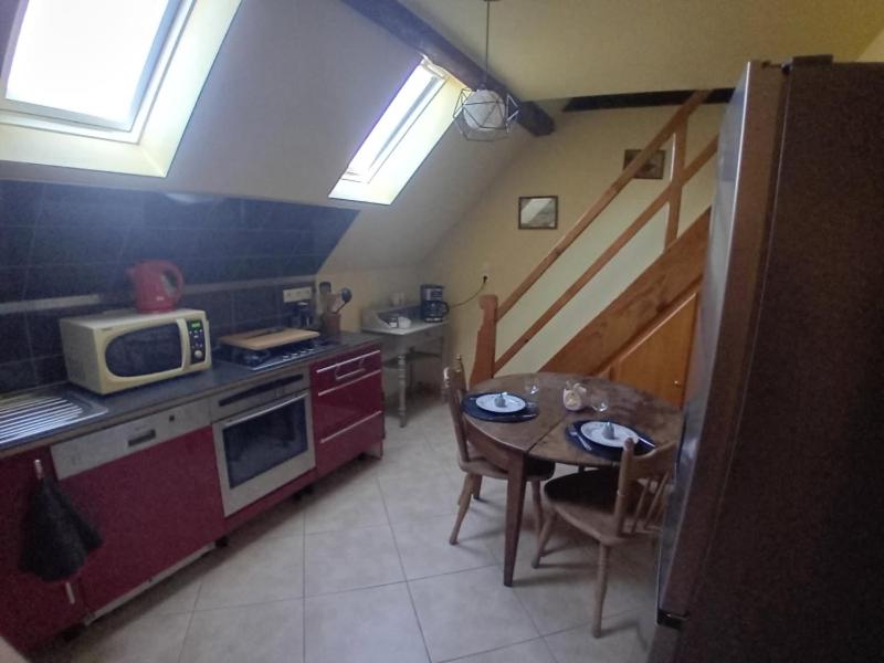 Kuchyň nebo kuchyňský kout v ubytování Chambre