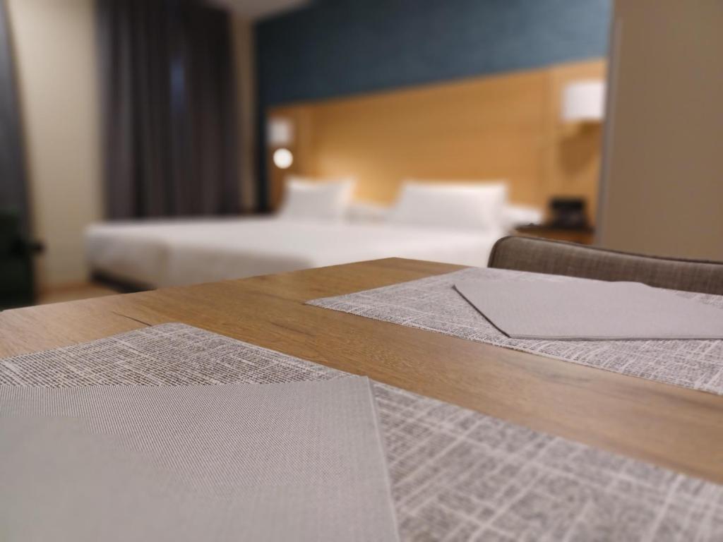 Postel nebo postele na pokoji v ubytování Hotel Zentral Mayoral