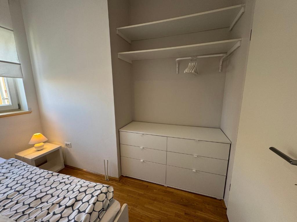 Łóżko lub łóżka w pokoju w obiekcie Apartments Mali Ivo