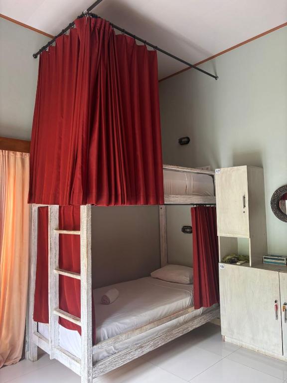 Postel nebo postele na pokoji v ubytování Castaway Island Hostel