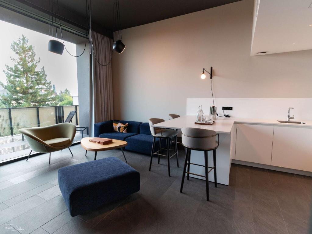 Posezení v ubytování L'Esquisse Hotel & Spa Colmar - MGallery Collection