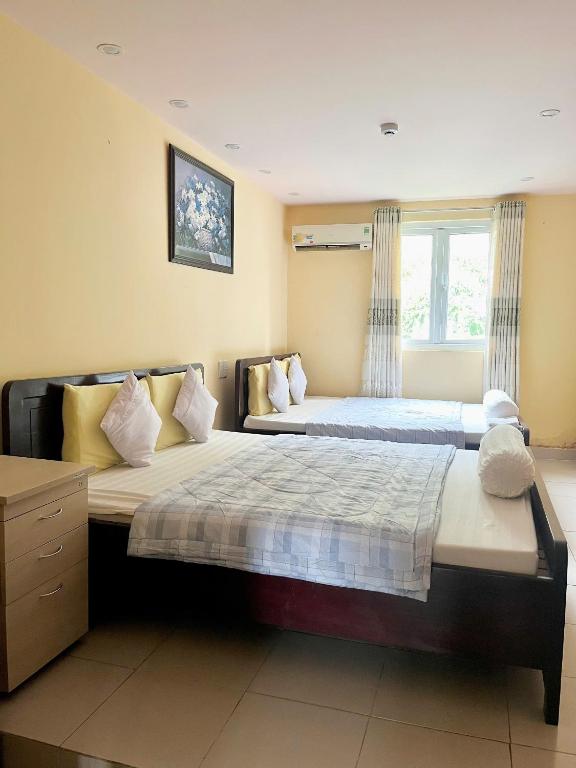 Postel nebo postele na pokoji v ubytování SEASONS Hotel