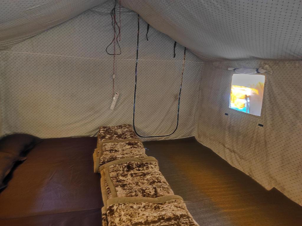 Postel nebo postele na pokoji v ubytování Baba tent House