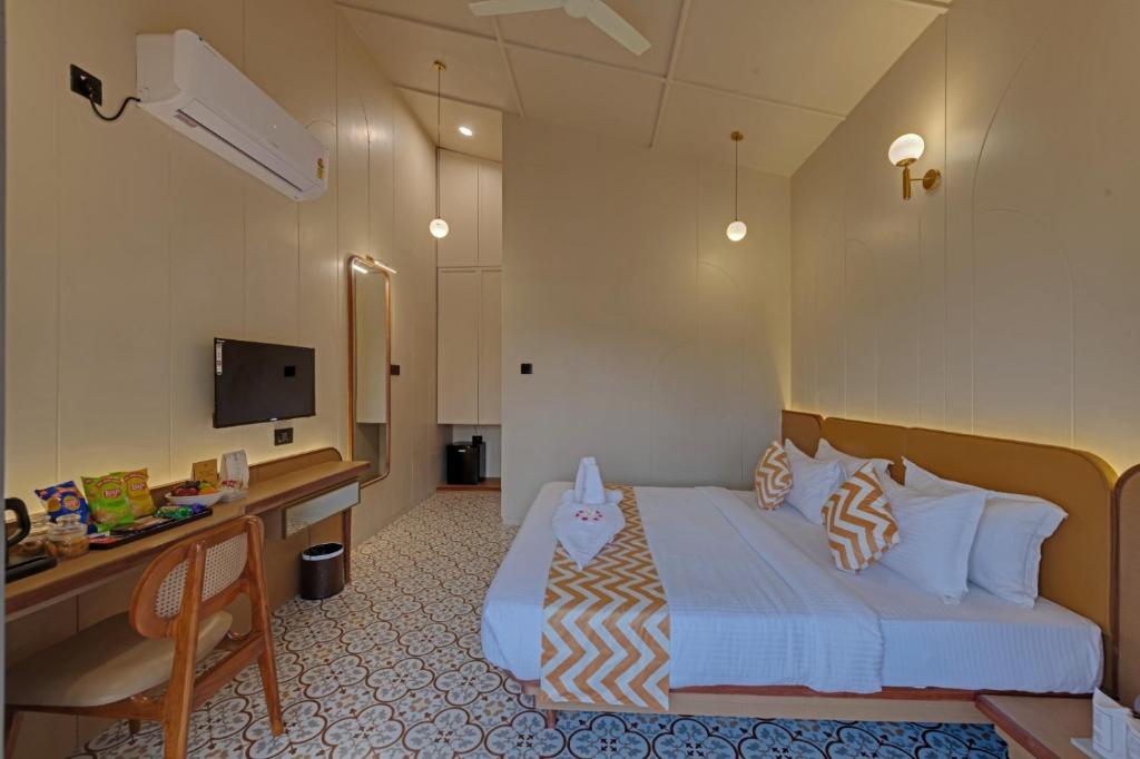 Sjónvarps- og/eða afþreyingartæki á Villa Euphoria Resort at Statue of Unity