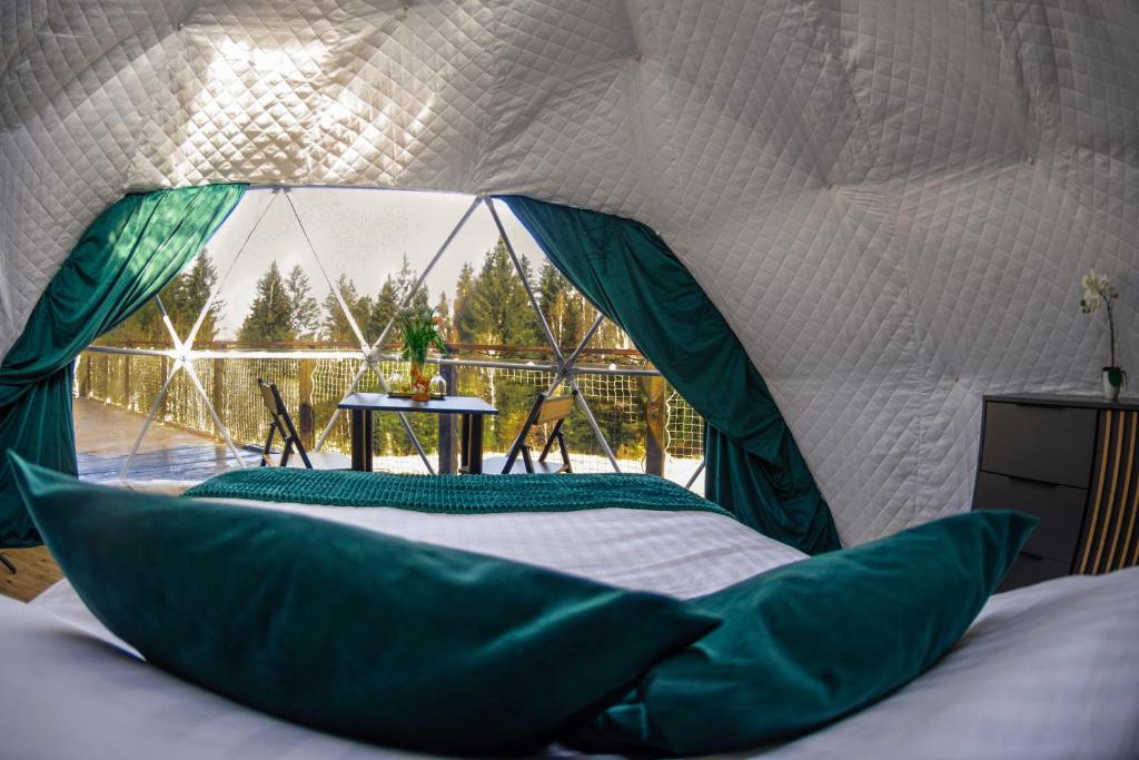 Postel nebo postele na pokoji v ubytování Goat Glamp Zieleniec
