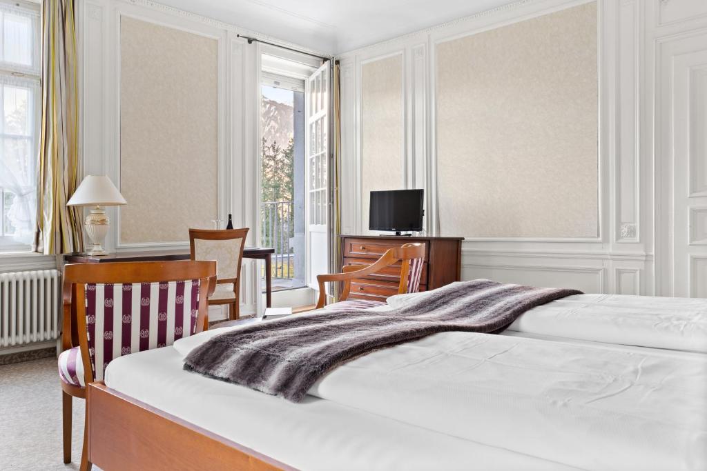 Postel nebo postele na pokoji v ubytování Hotel Schloss Ragaz