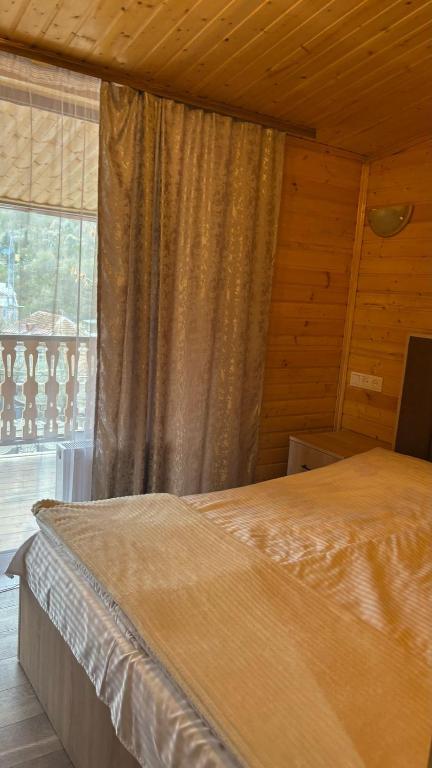 Postel nebo postele na pokoji v ubytování Dililuxe Hotel