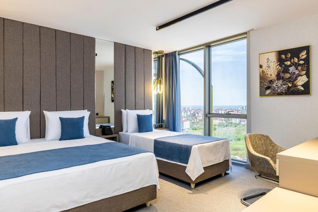 Rossi Luxury Hotel - Dreibettzimmer