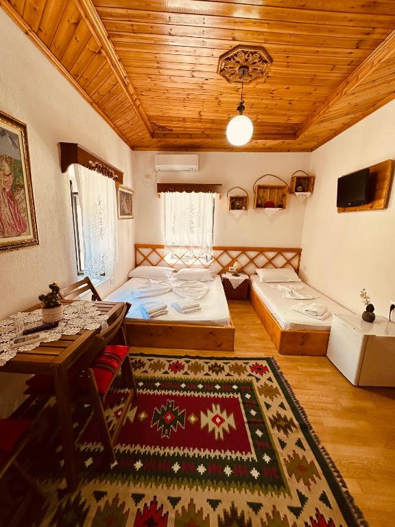 Postel nebo postele na pokoji v ubytování Kore Guest House