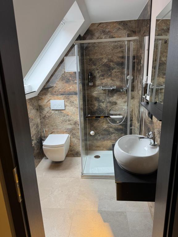 Koupelna v ubytování Hotel Heidelux
