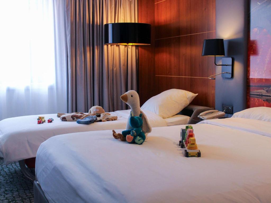 Postel nebo postele na pokoji v ubytování Hotel Mercure Toulouse Centre Compans