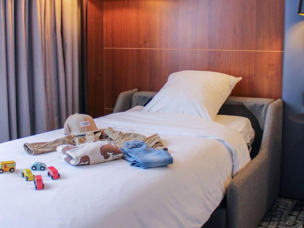 Postel nebo postele na pokoji v ubytování Hotel Mercure Toulouse Centre Compans