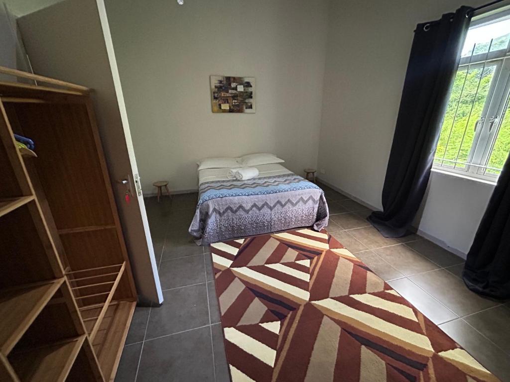 Postel nebo postele na pokoji v ubytování Chez Lisa