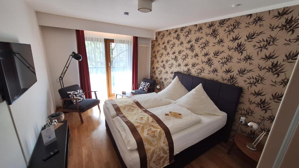 TV a/nebo společenská místnost v ubytování Solitaire Hotel