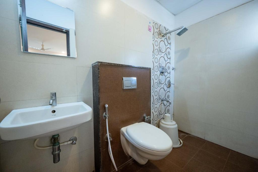 Koupelna v ubytování REGALIA INN &SUITES