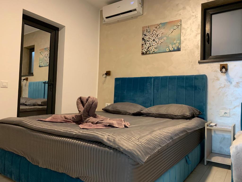 Postel nebo postele na pokoji v ubytování Neversea house