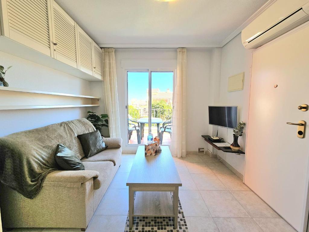 Televízia a/alebo spoločenská miestnosť v ubytovaní Appartement (Casa Nati)