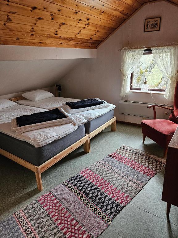 Postel nebo postele na pokoji v ubytování Slättö 17 Lammhult