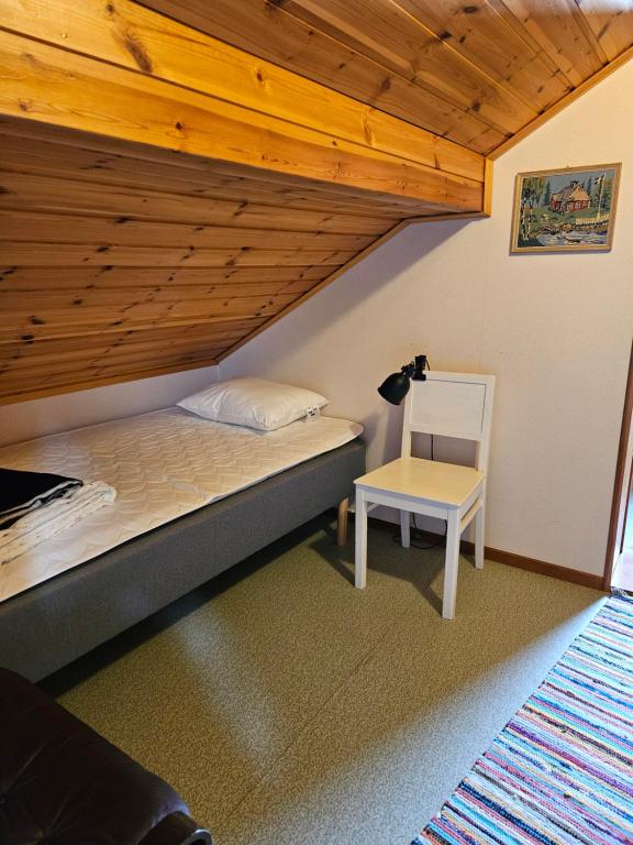 Postel nebo postele na pokoji v ubytování Slättö 17 Lammhult