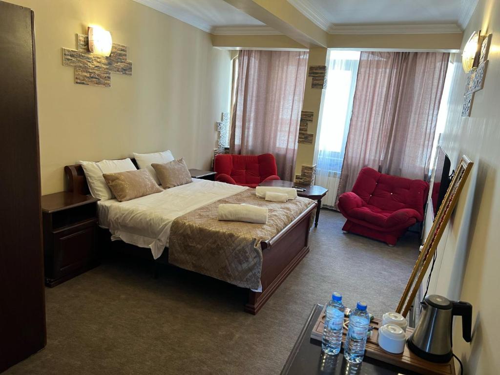 Postel nebo postele na pokoji v ubytování Ritsa Boutique Hotel