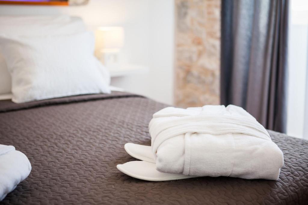 Posteľ alebo postele v izbe v ubytovaní Rooms Supreme Spalato