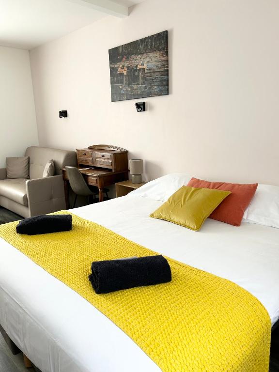 Postel nebo postele na pokoji v ubytování Hotel D'Angleterre